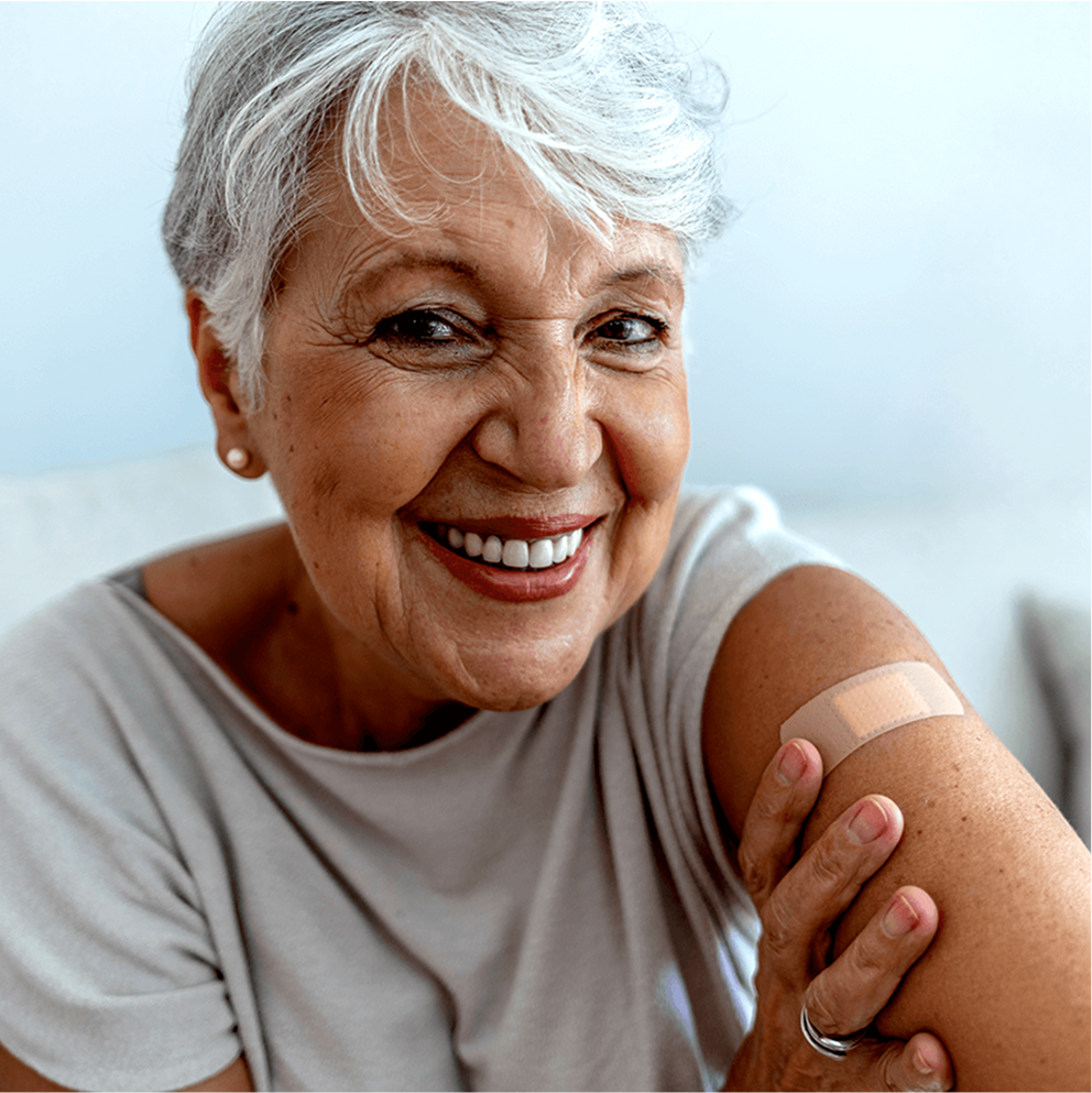 Woman with band-aid on her arm